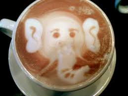 This is an elephant design in a latte cappuccino